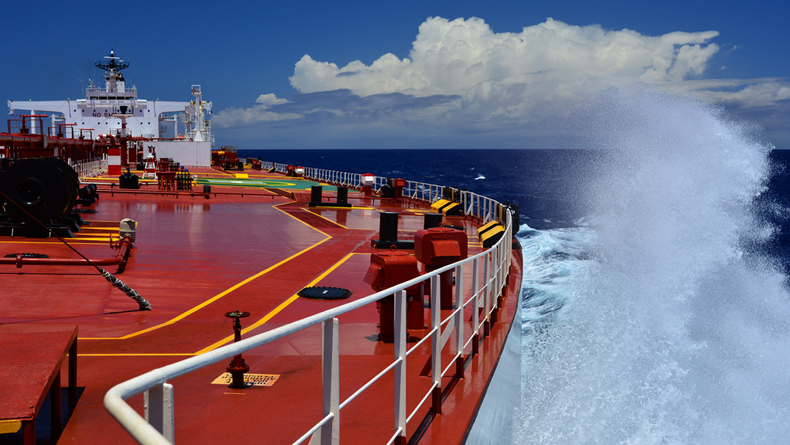 Tanker at sea, looking back down the deck