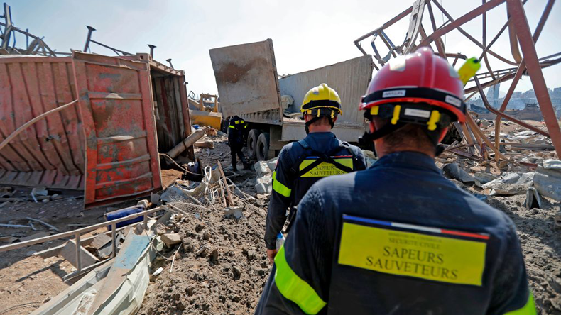 French rescue workers in the ruins of Beirut port. Credit Joseph Eid/AFP via Getty Images