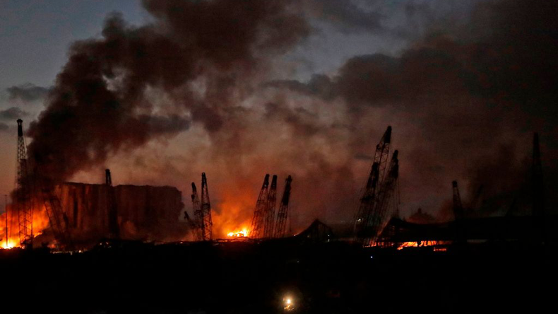 Beirut port blast: fires burning as night falls. Credit: Joseph Eid/AFP via Getty Images