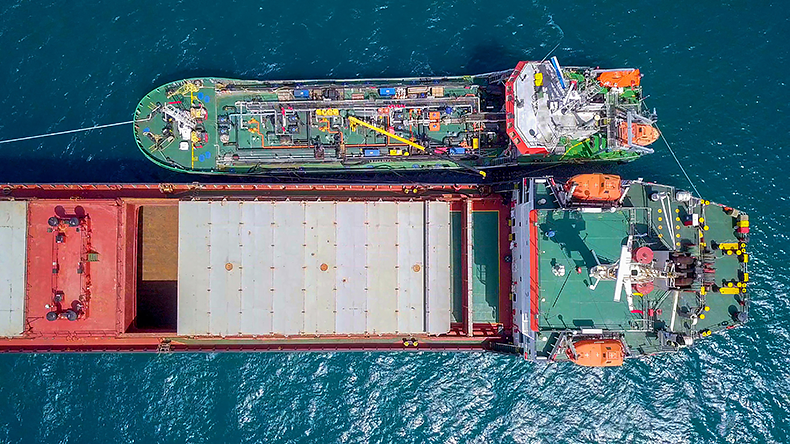  Aerial image of refuelling at sea with bunker refuelling a large bulk carrier