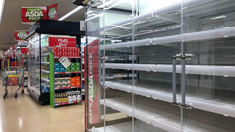 Empty refrigerators at Asda in Kettering, Northamptonshire. Picture date: Thursday October 14, 2021. Credit: PA Images / Alamy Stock Photo