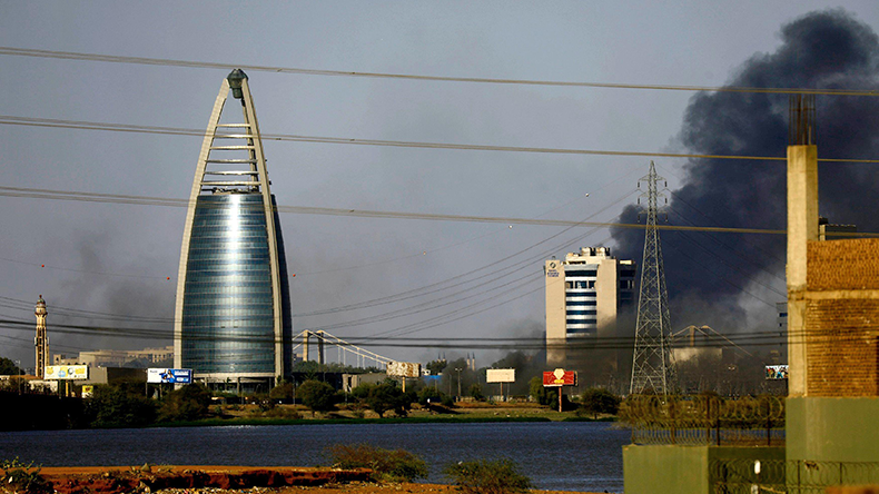 Khartoum in Sudan with fighting and black smoke from explosions
