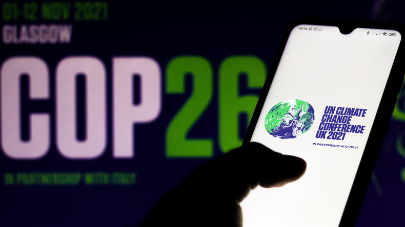The 2021 United Nations Climate Change Conference (COP26) logo seen displayed on a smartphone, Credit: Sipa US / Alamy Stock Photo
