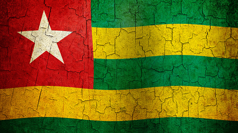 Togo flag on cracked wall