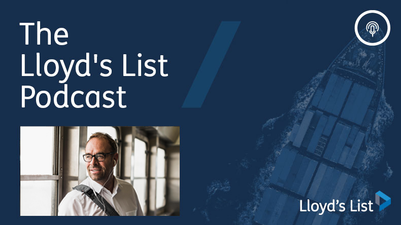Lloyd’s List Podcast top 10 for 2023 businessman with earphones on a ferry