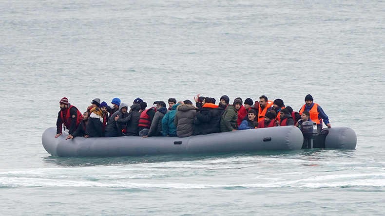 migrants adrift in a dinghy before being rescued off the coast of Folkestone, Kent, as small boat incidents in the Channel continue. Picture date: Saturday November 20, 2021. credit PA Images / Alamy Stock Photo