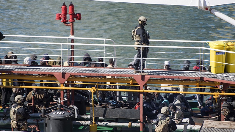 Armed forces stand onboard the Turkish oil tanker El Hiblu 1, which was hijacked by migrants, in Valletta, Malta, Thursday March 28, 2019. A Maltese special operations team on Thursday boarded a tanker that had been hijacked by migrants rescued at sea, and returned control to the captain, before escorting it to a Maltese port. (AP Photo/Rene' Rossignaud)