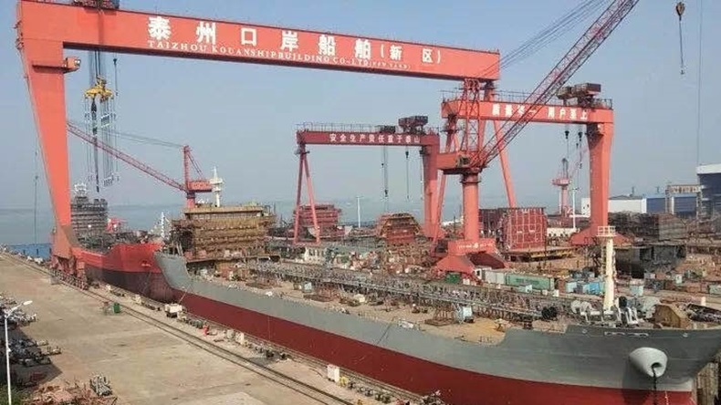 Overview of Taizhou Kouan Shipbuilding yard with gantry cranes in China