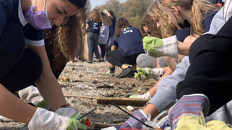 Young volunteers participate in a Helmepa-co-ordinated coastal clean-up