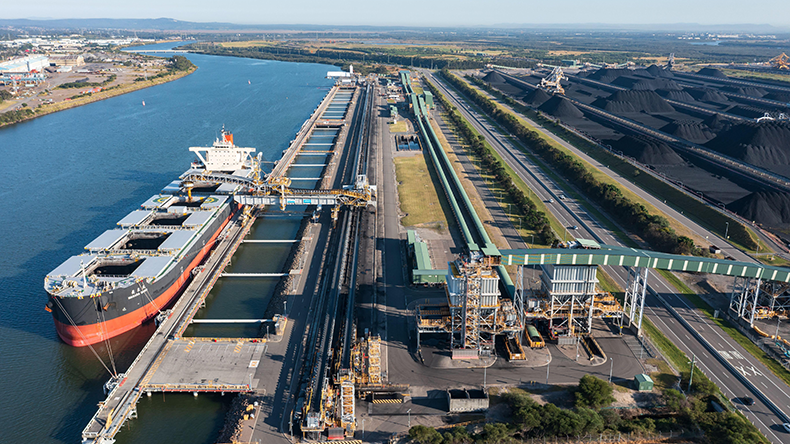  25 April 2021 - Newcastle, NSW, Australia. Aerial view of Japanese bulk carrier NAGARA MARU being loaded with coal and coal loading structures. - Image ID: 2FK6792     Credit: Harley Kingston / Alamy Stock Photo 