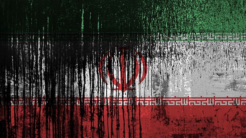 Iran flag depicted in paint colors on old and dirty oil barrel wall close up. Textured banner on rough background.  Image ID: 2AE0DG5 Credit: Mykhailo Polenok / Alamy Stock Photo 