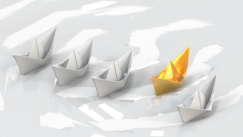 An illustration of paper ships on a white background 
