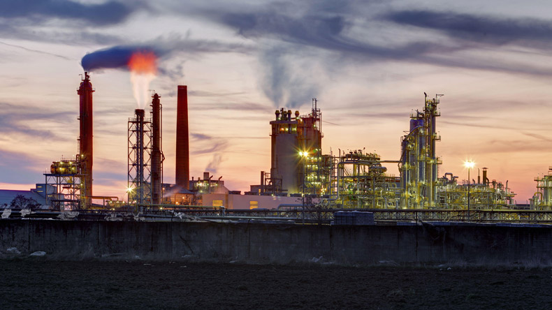 Oil refinery at evening