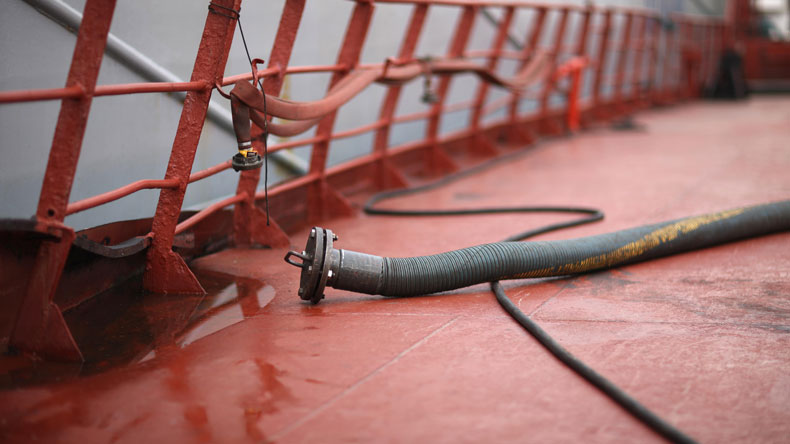 Fuel hose lying on tanker deck