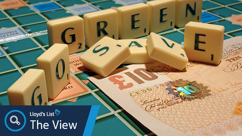 Scrabble letters arranged to say 'Go Green Save Money'