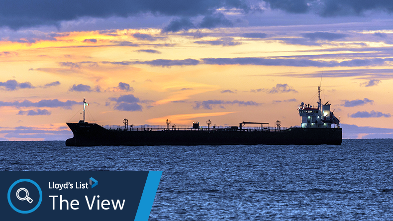 Oil tanker at sea at dawn