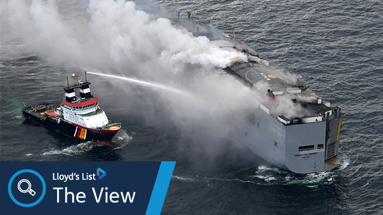 Fremantle Highway car carrier on fire with firefighting vessel