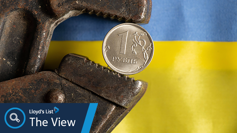 Russian ruble in a wrench with Ukraine flag behind
