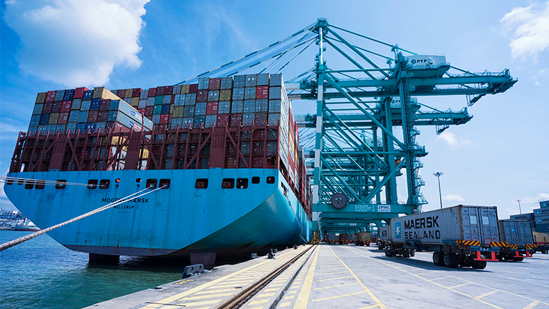 One of the biggest containerships in the world, Morgens Maersk, lies alongside at PTP, Malaysia. 