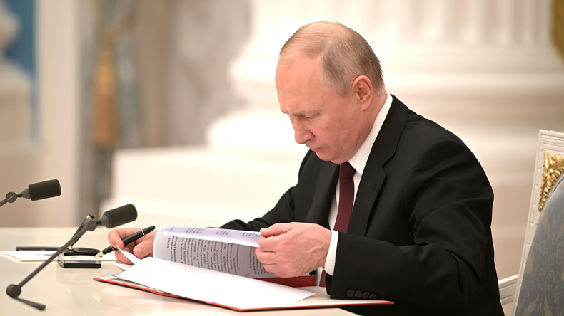 President Putin signing documents recognising Ukraine's Donetsk and Lugansk regions as independent states