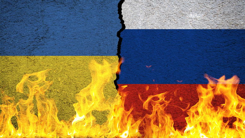 Ukraine-Russi war concept image; flags in flames. Yalcin Sonat / Alamy Stock Photo